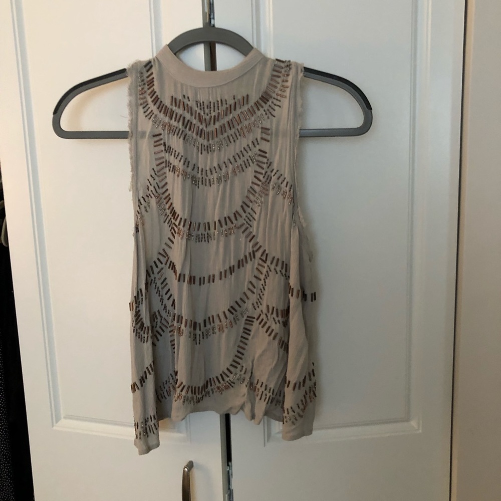 Freepeople grey w/sequin design tank. Open back XS